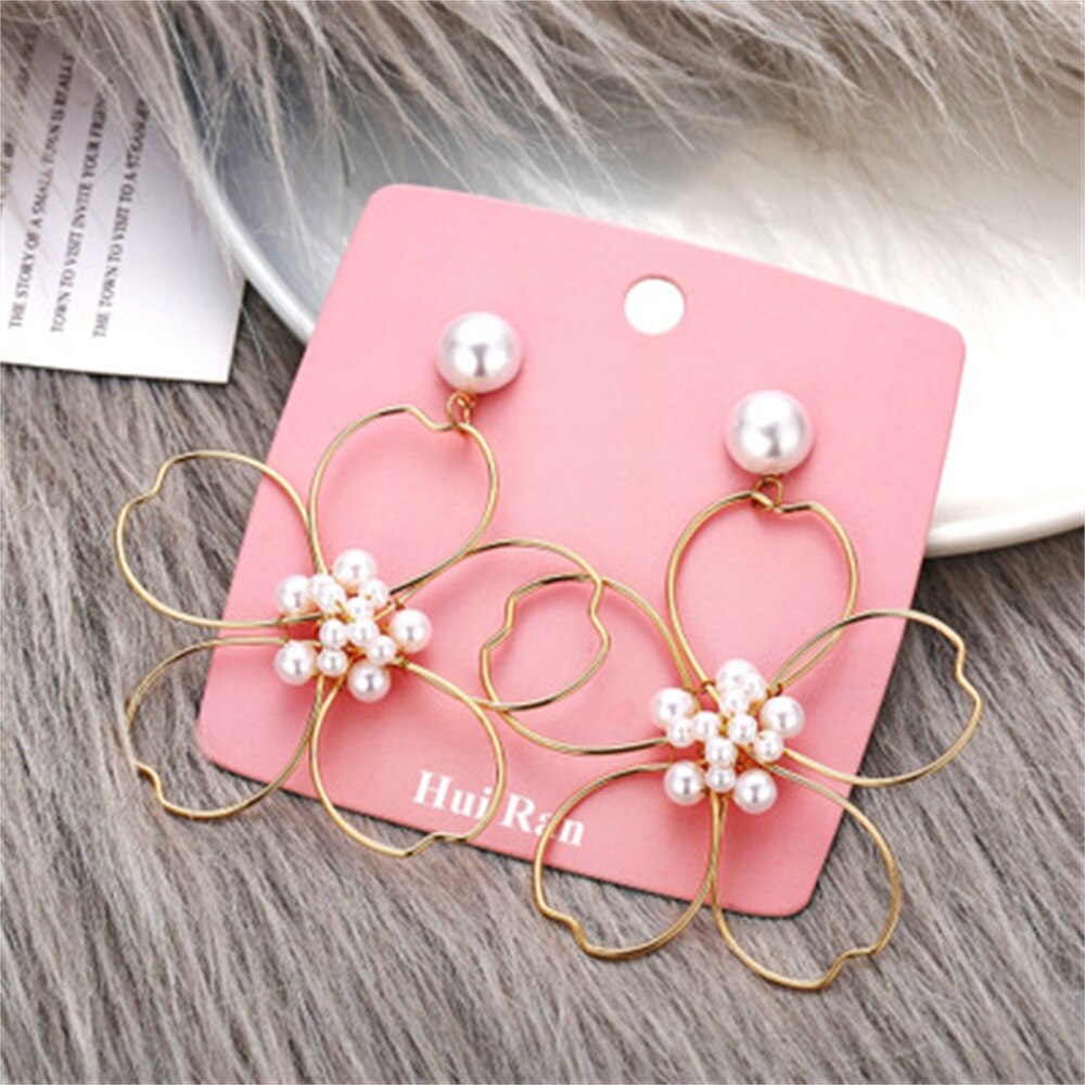 5041151 European and American flower pearl earrings retro simple daisy flower earrings