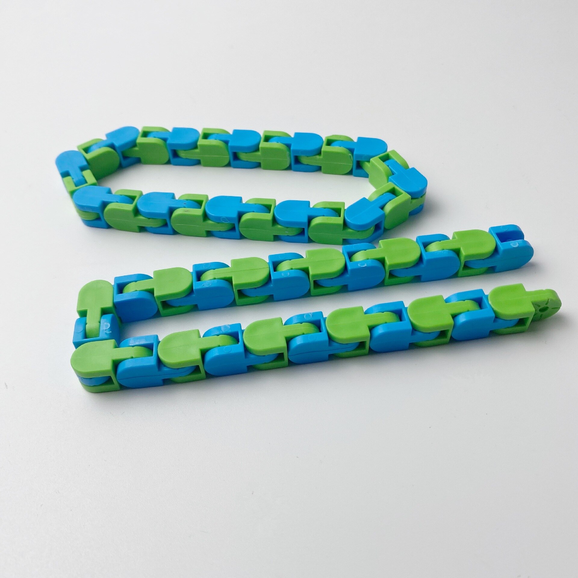 24 Links Wacky Tracks Snap Klik Fidget Speelgoed Vinger Zintuiglijke Snake Puzzels Voor Stress Party Bag Vulstoffen Party Gunsten: blue  green