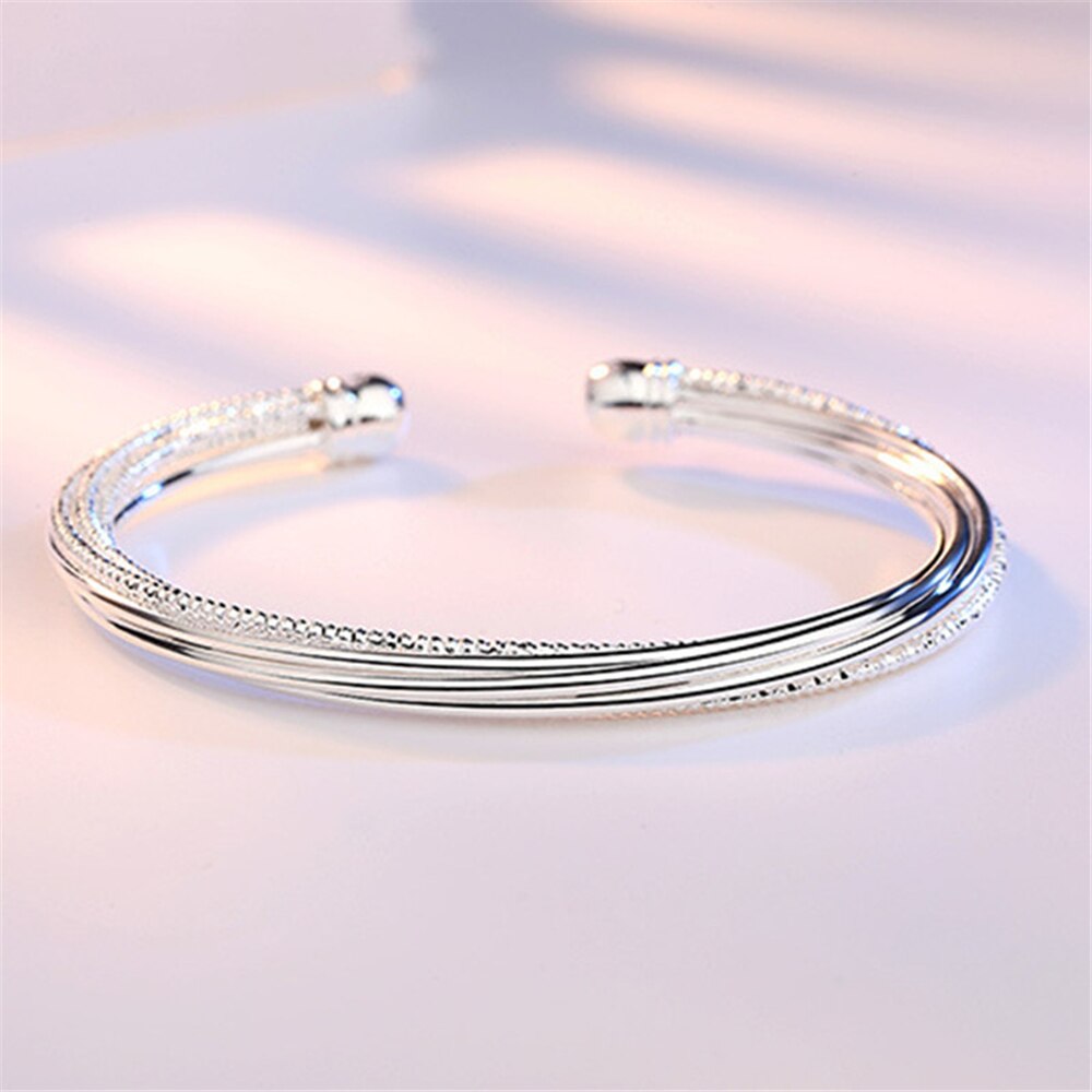 S999 – modèle de bracelet pour femme, couleur argent, ligne torsadée, bouche ouverte, simple, ligne florale de voiture, bijoux