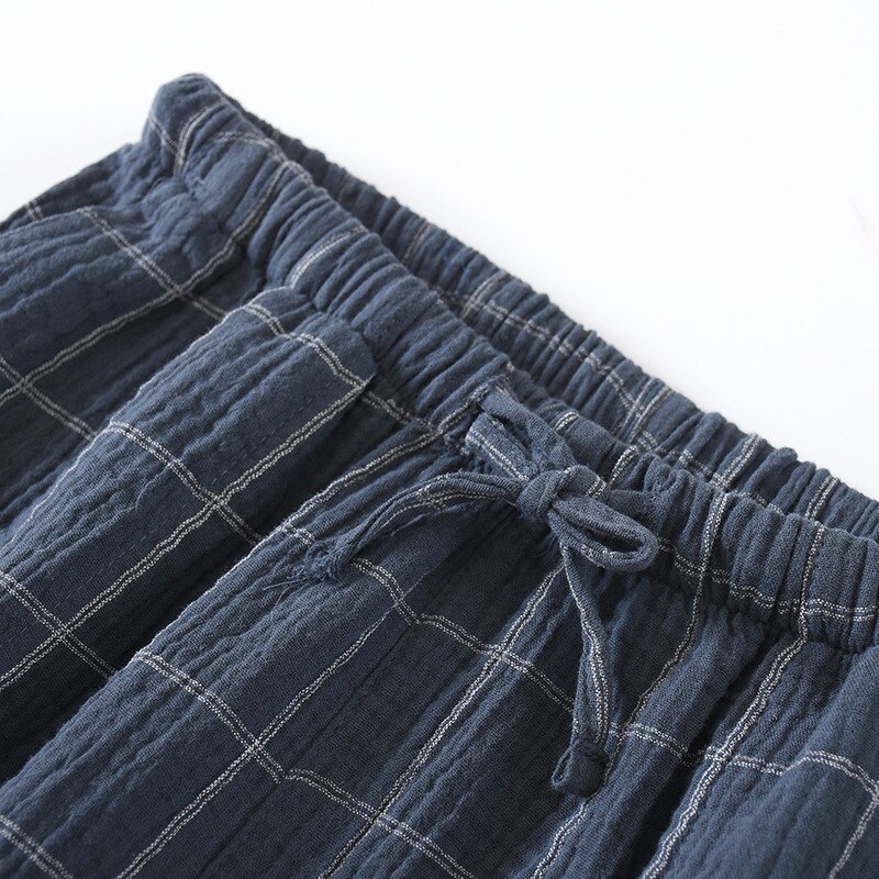 Pantalones cortos de tela de crepé de algodón para hombre, Shorts finos transpirables de gran tamaño, pantalones de pijama de celosía Simple para casa, ropa de dormir, novedad de verano