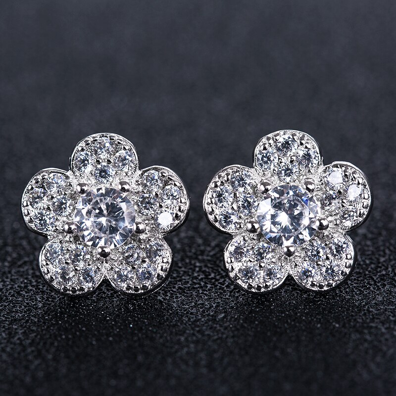 Huitan-pendientes de planta romántica para niña, con forma de flor pequeña Simple con forma de flor, aretes de tuerca de circón cúbico blanco rosa claro