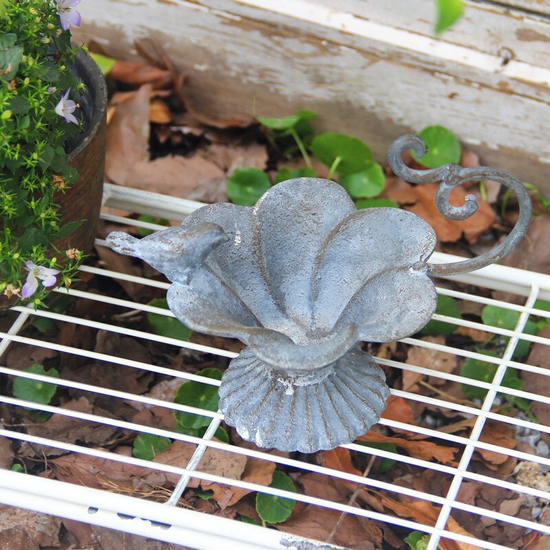 small retro rustic cast iron bird feeder