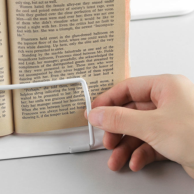 Multifunctional reading rack for students to read books