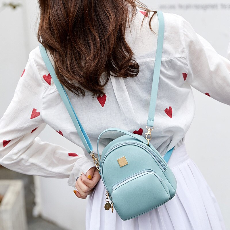 NIGEDU mini sac à bandoulière pour femmes dames sacs à main cuir PU bonbons couleurs forme populaire filles sac à bandoulière sac à dos noir