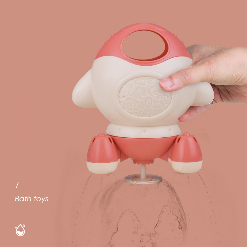 Play water rocket toy clockwork swimming children kids summer bath shower baby squirting beach toy for children: Pink rocket