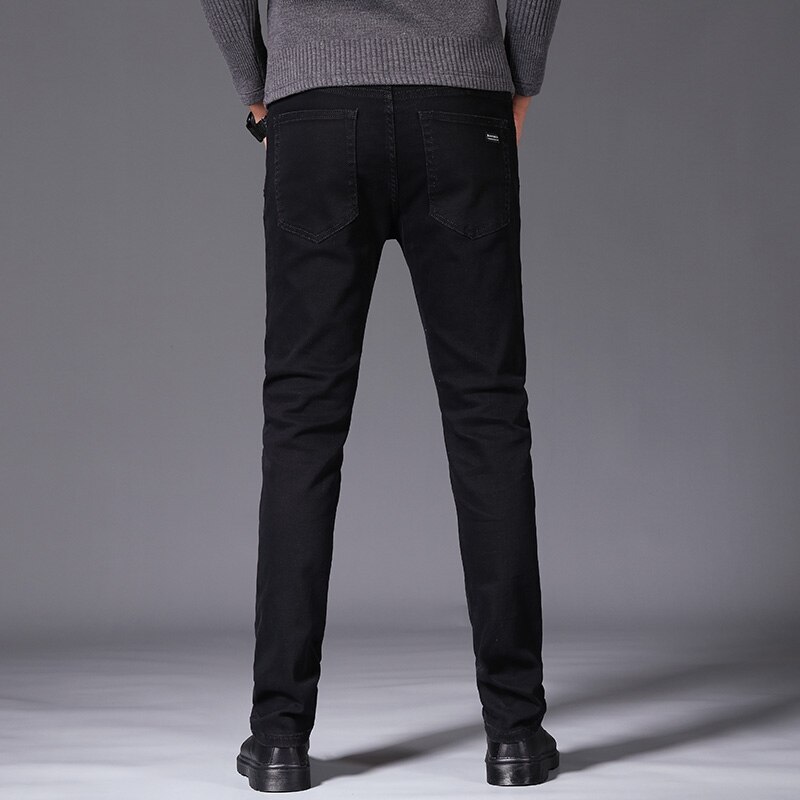 Black plus velvet men's business casual jeans Classic loose soft cotton trousers winter Warm pants