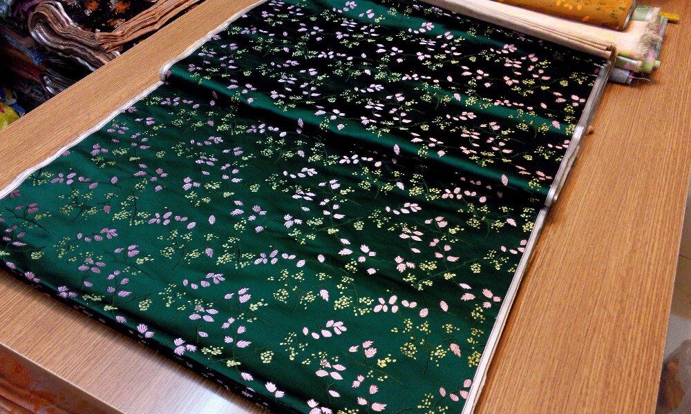 chinese silk brocade woven damask damask fabric cheongsam cushion dark green back with gold seeds and pink leaf pattern
