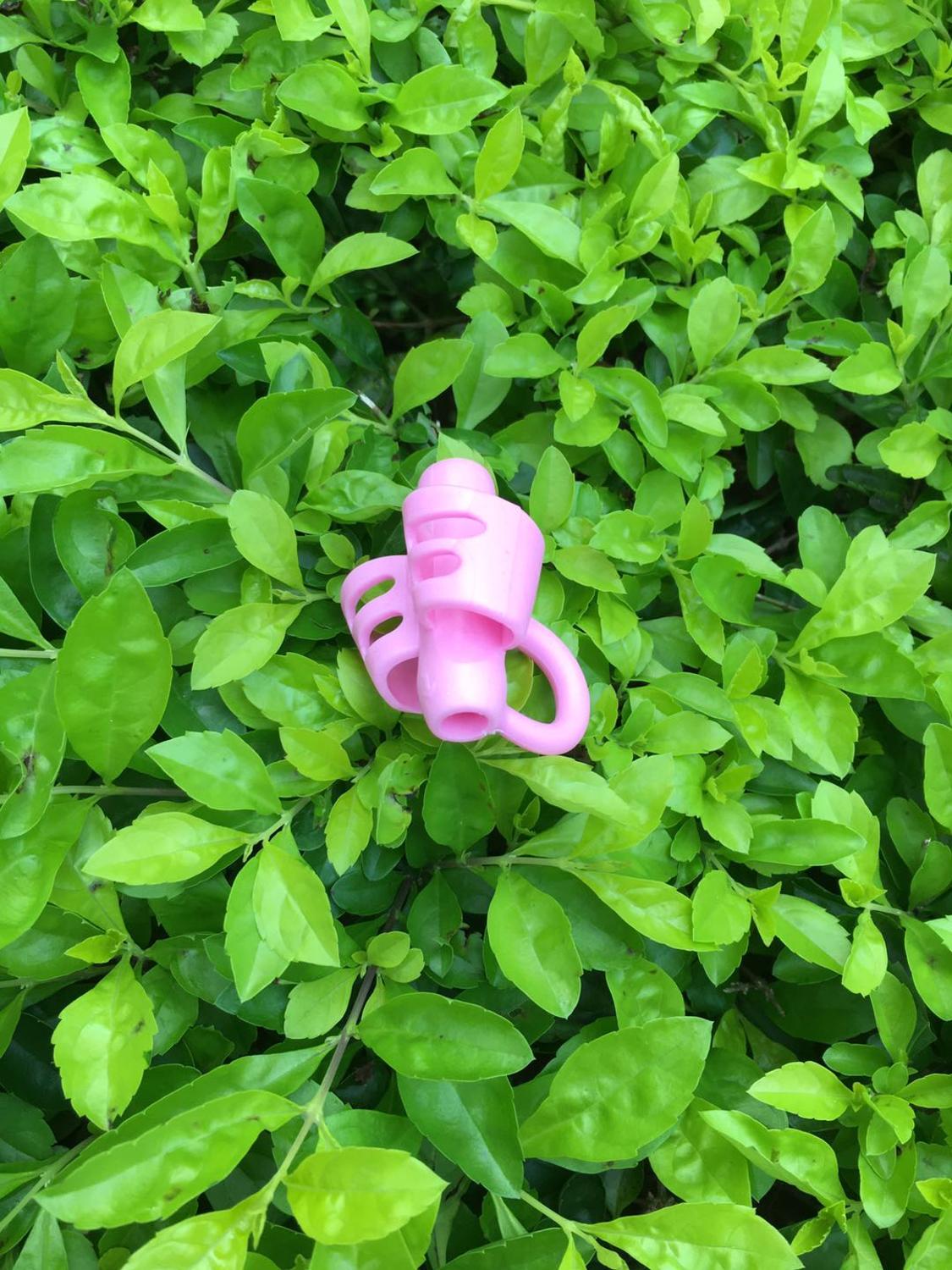 genuine two-finger TPR pencil holder pen holder sleeve writing learning correction tool pen holding corrector holder sleeve: Pink(three-finger)