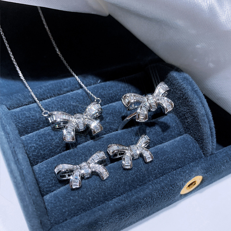 Neue Bogen Knoten Silber Farbe Ohrring Halskette Ring einstellen Bling Zirkon Stein Braut Schmuck Damen Partei Schmuck setzt