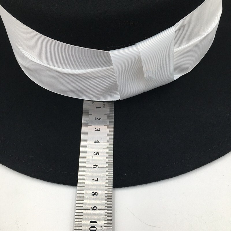 In Europe and the British flat top hat black wool hat Sir hat Fedora Panama