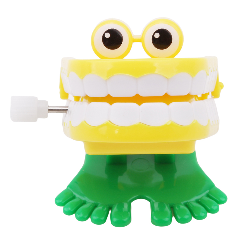 Foråret wind-up jump tand tandlegetøj dental wind-up dejlige foråret plast legetøj jump tænder kæde til børn
