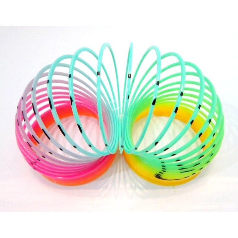 10 pz/impostato anti-fatica Magia di Sorriso di Plastica Arcobaleno Primavera Cerchio Colorato Bobina Elastico Anello di Giocattoli Educativi per I Giochi per Bambini