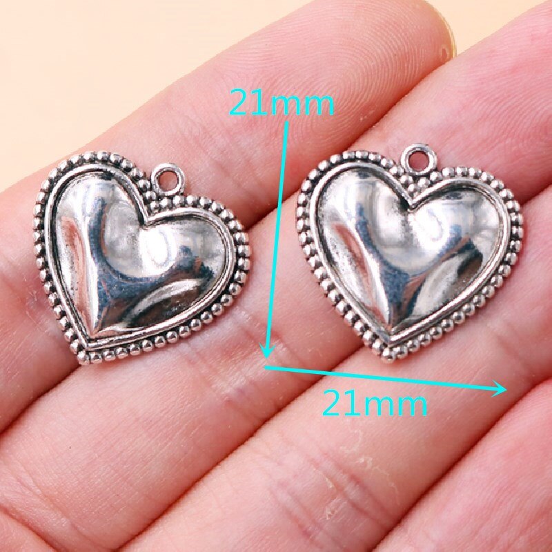 10 pièces plaqué argent coeur de l'éternel charme Vintage collier boucles d'oreilles pendentif en métal bijoux à bricoler soi-même artisanat faisant 21*21mm