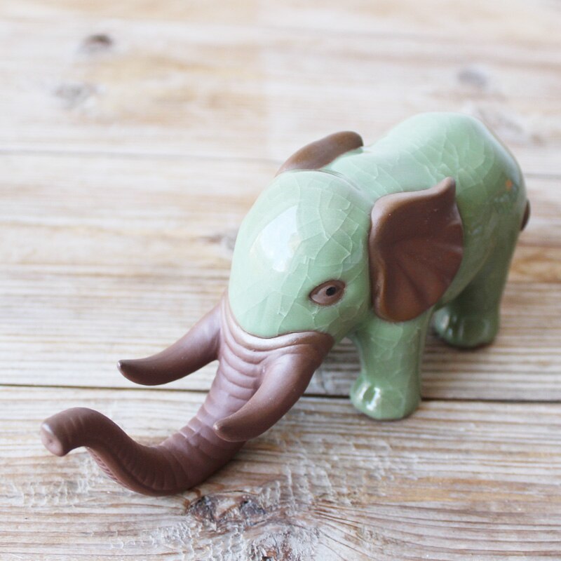 Elefant te husdjur prydnadsföremål utsökt te kan höja öppna skivor lila lera te leka gynnsamt djur te prydnader