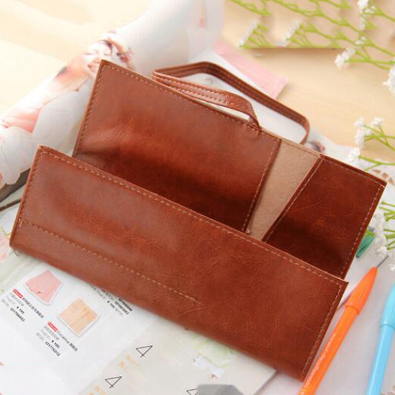1 Uds. Estuches Retro creativos de cuero PU rollo bolsa pluma bolsillo para material de papelería bolsa de cosméticos