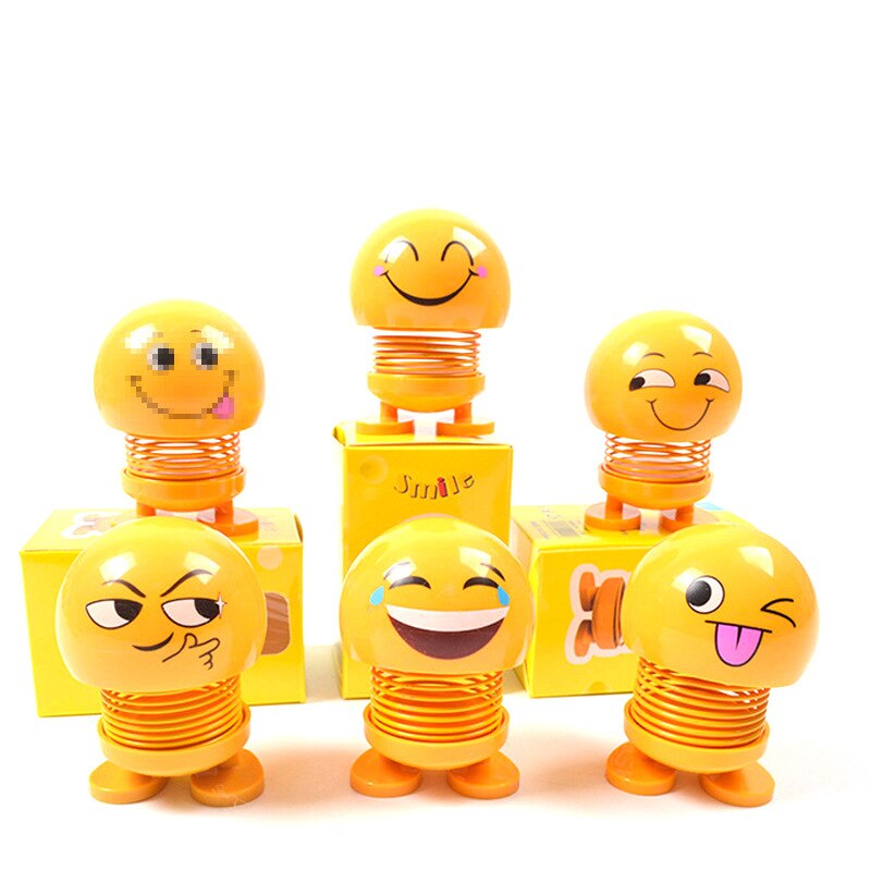 Śmieszne słodkie lalki twarzy pouruszająca głową lalka w samochodzie kreatywny samochód słodkie ozdoby wiosenne wyrażenie