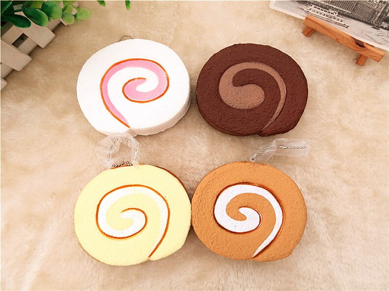 Kuutti Squishy juguete antiestrés Kawaii lindo rollo suizo pan de la torta blandita lento aumento de Jumbo Chocolate Rosa Amarillo Blanco Squishies