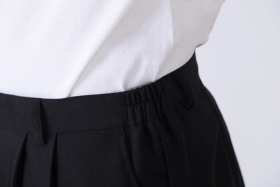 Pantalons de travail les pantalons de chef noirs sont élastiques et les pantalons pour hommes et femmes sont disponibles pour quatre saisons