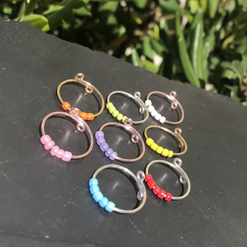Anillo giratorio con cuentas de colores para niña y mujer, juguete de anillo antiestrés y ansiedad, espiral, giratoria