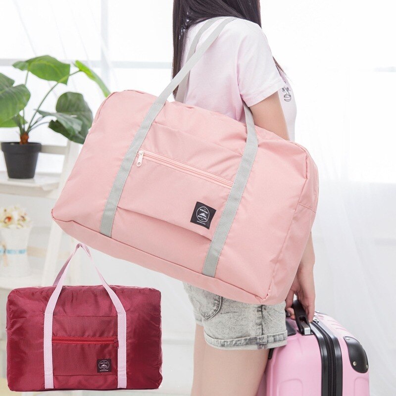 Neue Nylon Faltbare Reisetaschen unisex Große Kapazität Tasche Gepäck für Frauen Wasserdichte Handtaschen Männer Reisetaschen