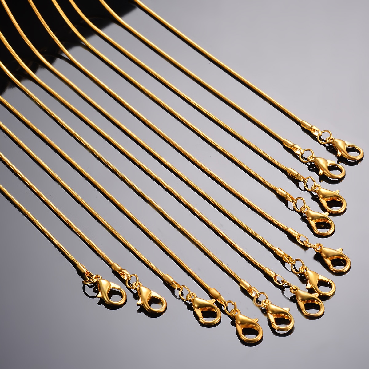 Commercio tutto'ingrosso 12pz di Larghezza 1.2 millimetri di Lunghezza 45-60 centimetri Oro Collana Della Catena Del Serpente Dei Monili di DIY Che Fanno per Il Pendente del Braccialetto della collana
