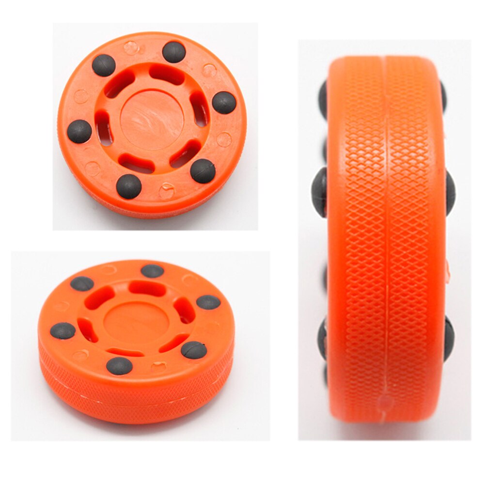 Perfekt ausbalancierter übungsrund-abs-hochdichte-rollhockeypuck, orange, langlebige anti-roll-zubehörräder