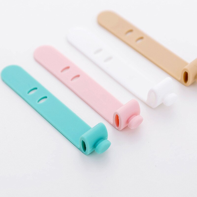 Enrouleur de câble d'écouteurs en Silicone, 4 pièces, support de cravates pour écouteurs iPhone Samsung MP4, organisateur de bureau