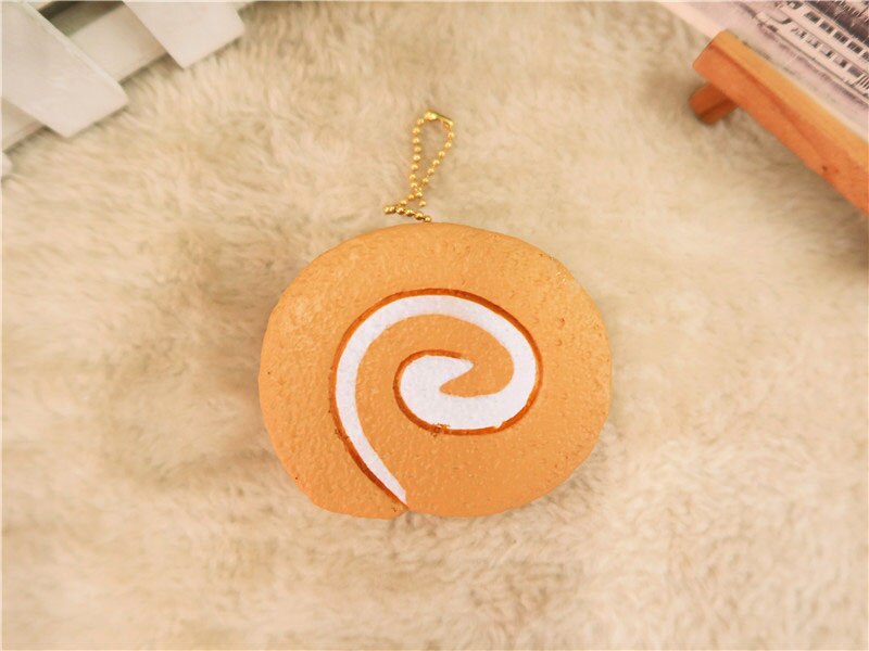 Kuutti Squishy juguete antiestrés Kawaii lindo rollo suizo pan de la torta blandita lento aumento de Jumbo Chocolate Rosa Amarillo Blanco Squishies: 7CM Chocolate