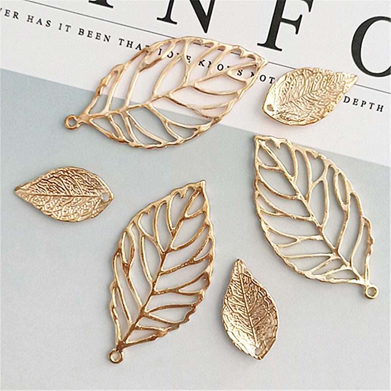 10 stk/lot legering bladgull anheng knapper ornamenter smykker øredobber choker hår gjør-det-selv smykketilbehør håndlaget