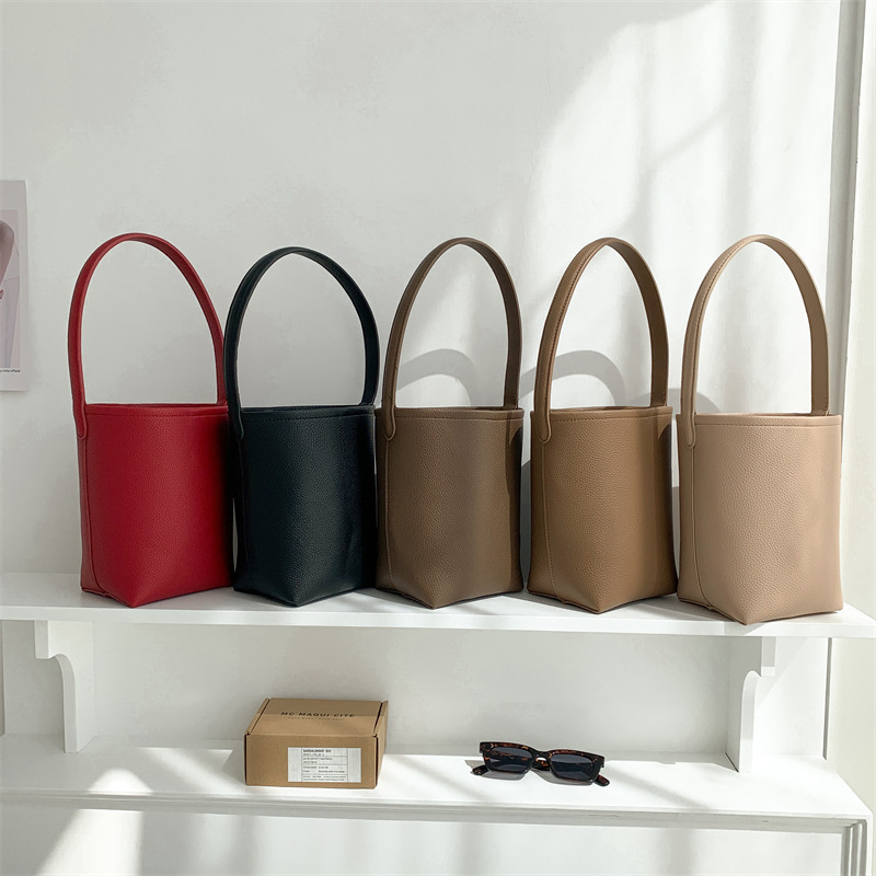 Bolso casero para mujer, bolso Retro de cuero suave portátil 2025, bolso de cubo que combina con todo, bolso de hombro para ir al trabajo, bolsos y bolsos