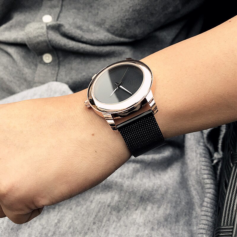 Enmex creatieve stijl cool horloge gloden Lichtgevende handen met roestvrij stalen band Stijlvolle klok quartz horloge