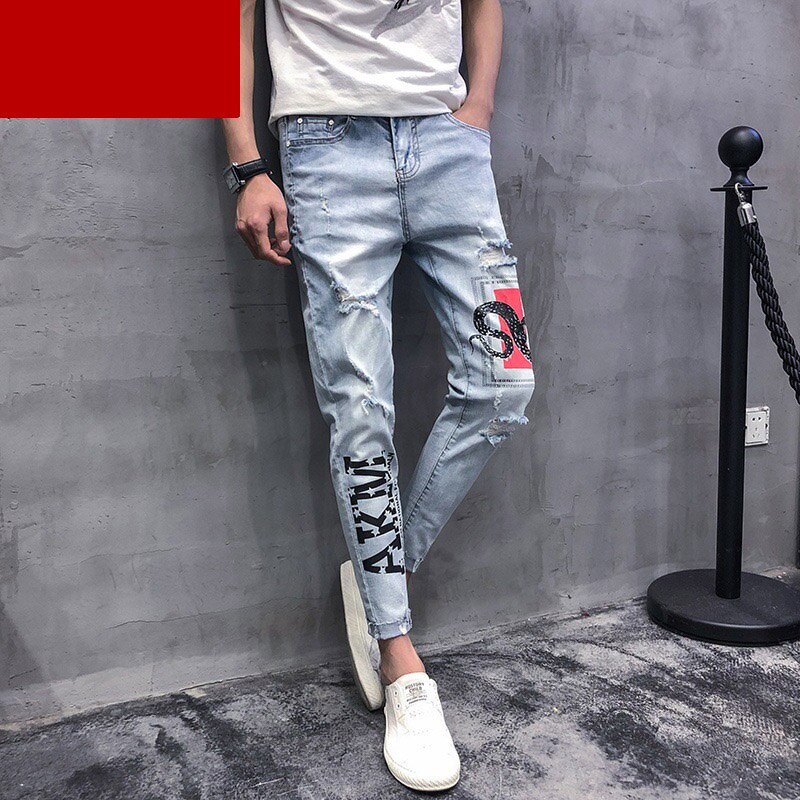 Höst slitna hål ljusblå ormtryckt hip hop street jeans herr koreanska smala tiggarfötter pennbyxor herrbyxor
