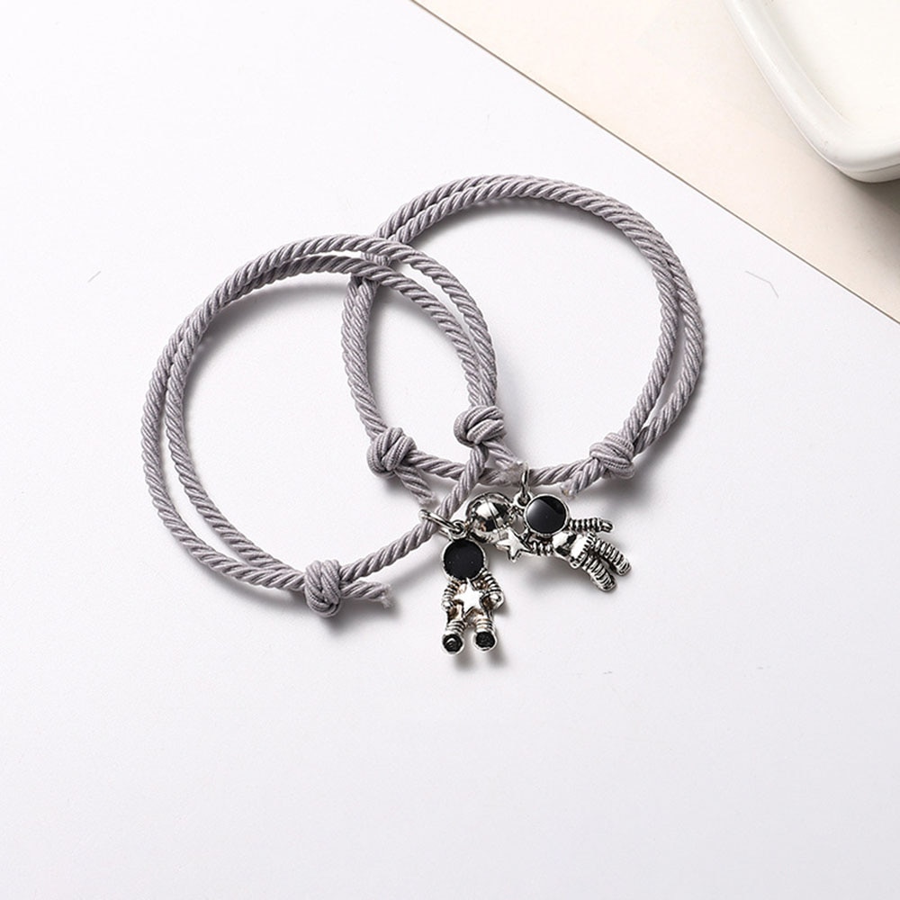 Pulsera de pareja astronauta pequeña banda de Goma para enviar novia novio imán piedra brazalete con cascabel nudo de la cuerda de la joyería