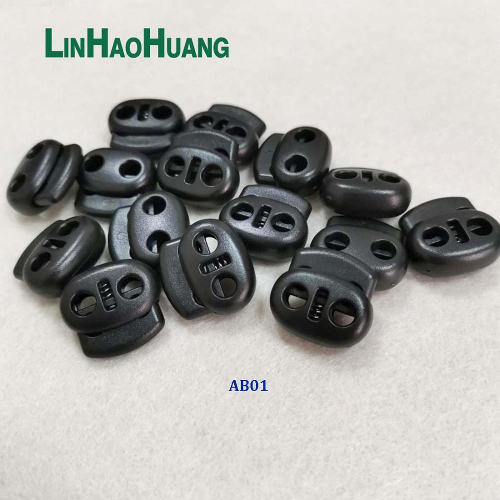 100 stk/lot svart pom plast kule ledning lås veksler plast 2 hull fjær stoppere 4mm strikk sjokk ledning