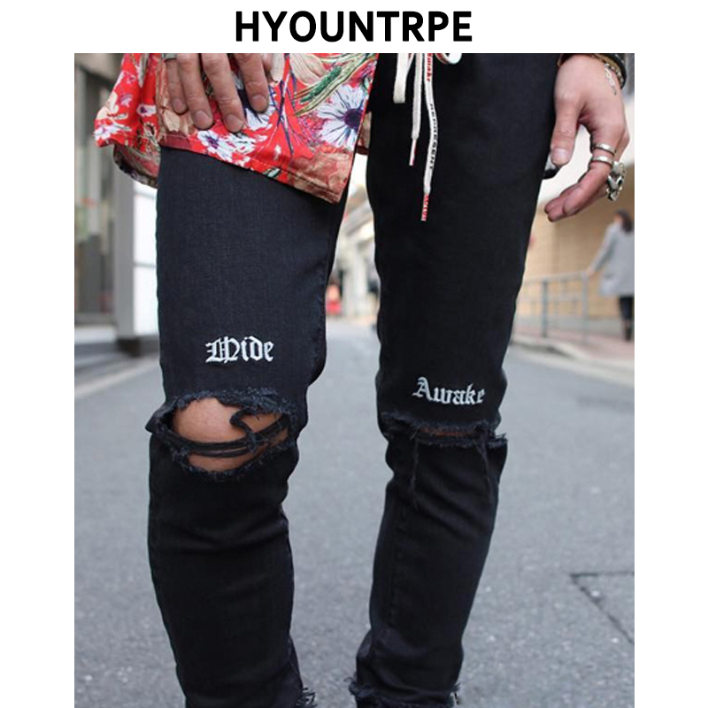 Pantalones vaqueros rasgados bordados hasta la rodilla para hombres Hip Hop skinny de motorista pantalones vaqueros rotos con cinta Slim Fit pantalones vaqueros negros Jogger