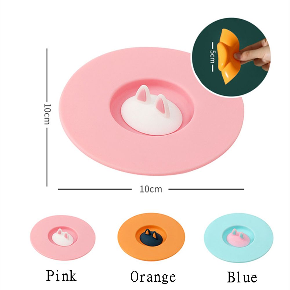 Durable, non-toxic, reusable coffee mug with sealed cover and anti-scalding suction cup lid.