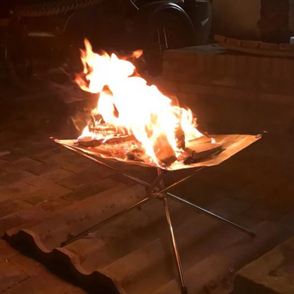Utomhus camping vandring vid vattnet bbq brasa lägereld vedkamin eldstomme hopfällbar trädgård bakgård uppvärmning mesh eldstad