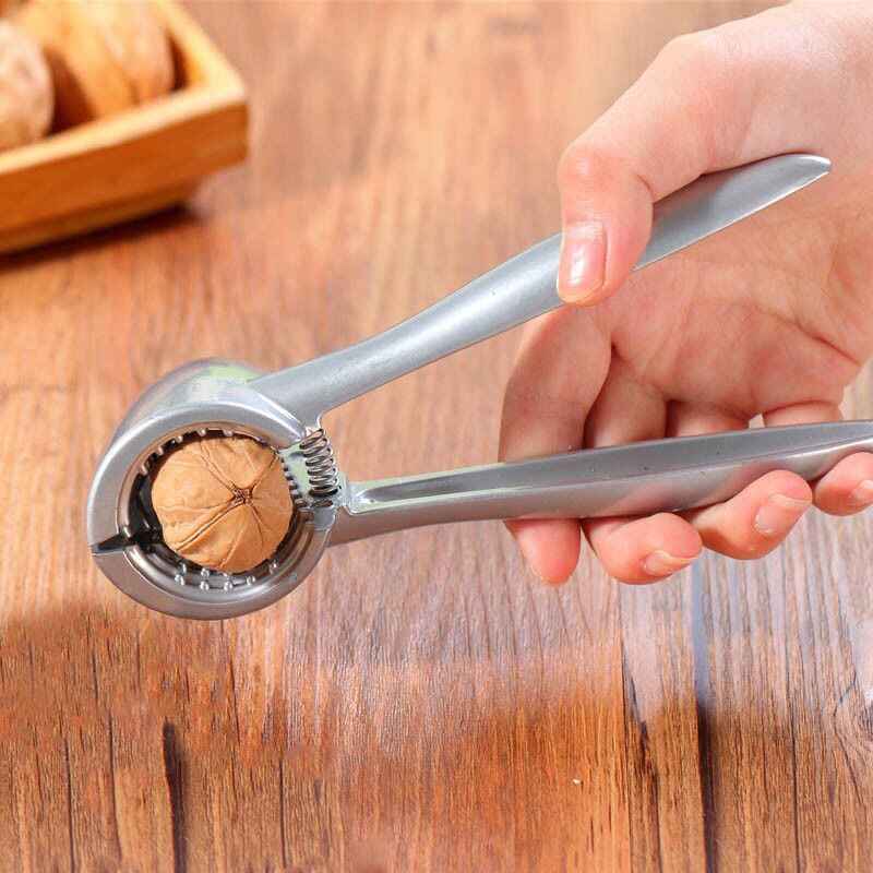 Knekke mandel valnøtt pecan hasselnøtt hassel filbert nøtt kjøkken nøtteknekker skallklips verktøyklemme tang kjeks