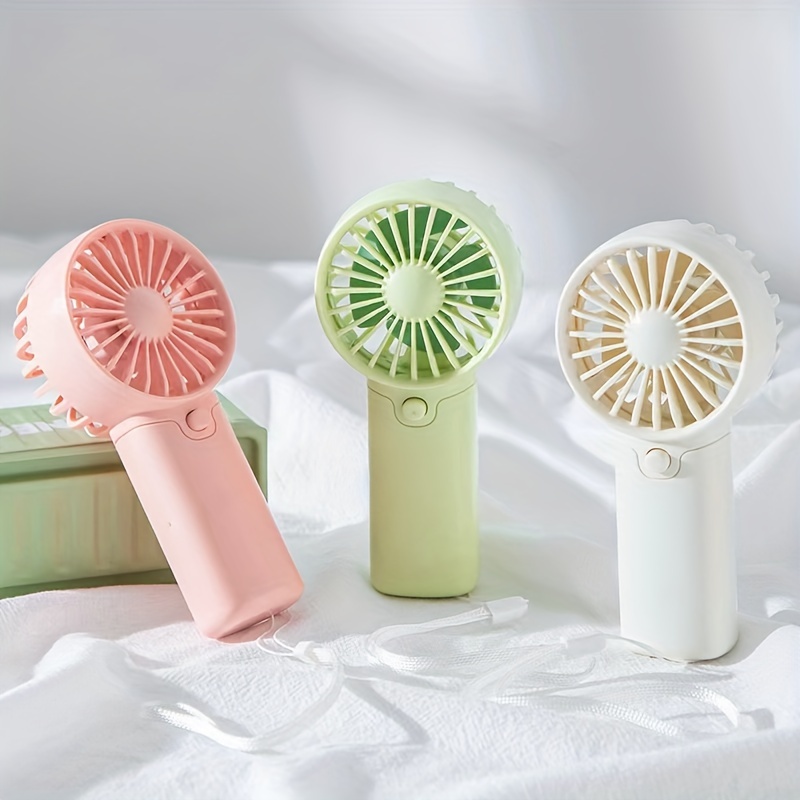 Mini ventilador portátil, ventilador de mano ligero, ventilador de refrigeración con pilas AA para oficina, viajes al aire libre, Camping