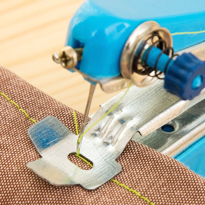 Portable Mini Manual Sewing Machine DIY Needlework Cordless Hand-Held Clothes Fabrics Sewing Handwork Tool Simple Operation