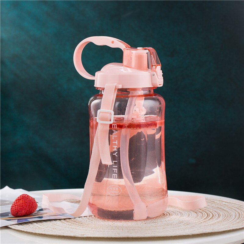 1.5l grandes bouteilles d'eau potable en plastique transparent de grande capacité pour le tourisme de fitness en salle de sport bouteille de sport sans bpa avec paille: Rose