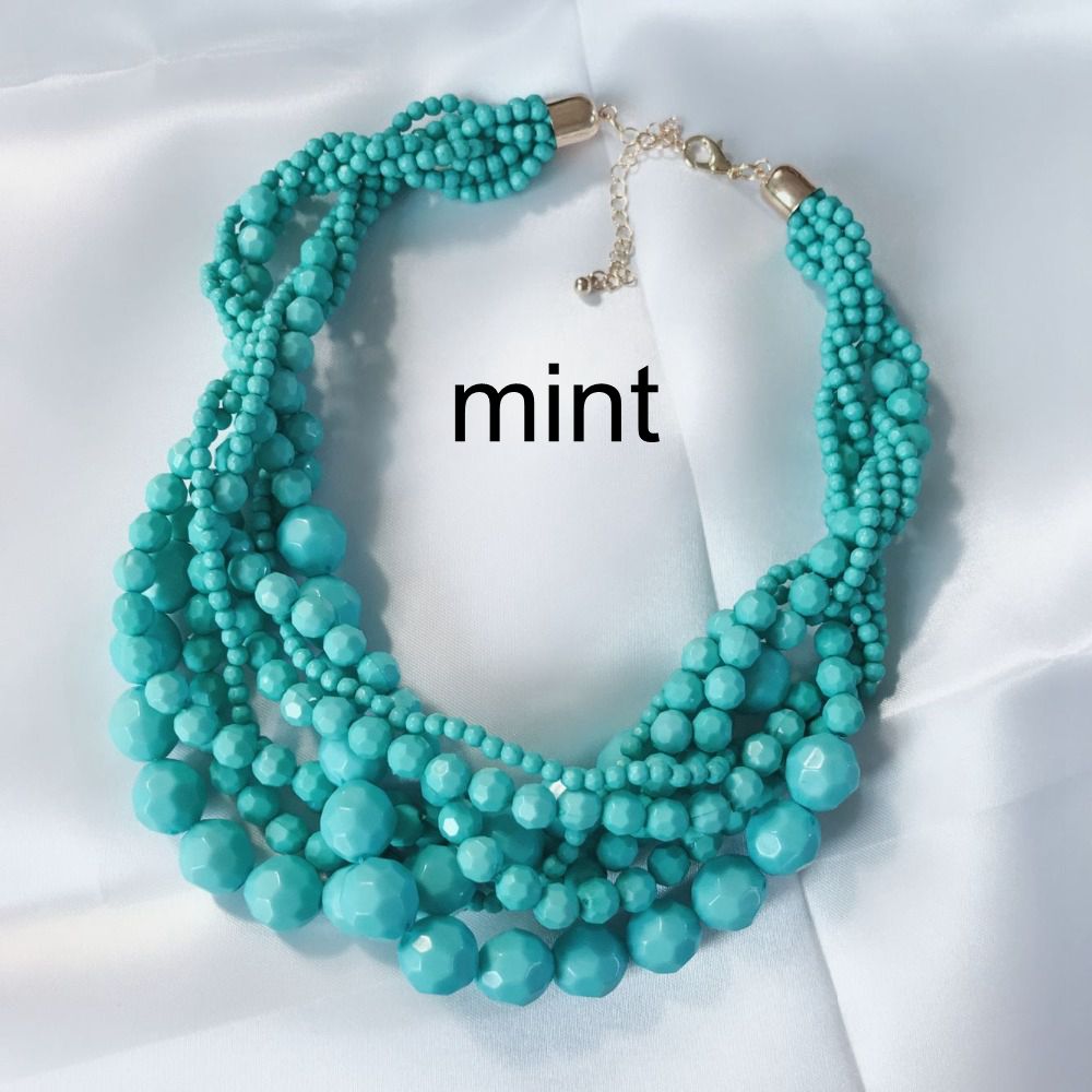 Gult mörkrött flätat halsband med akrylpärlor