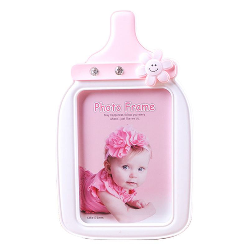 Baby cartoon flesvormige fotolijst voor een kind met een verjaardagsfoto: Roze