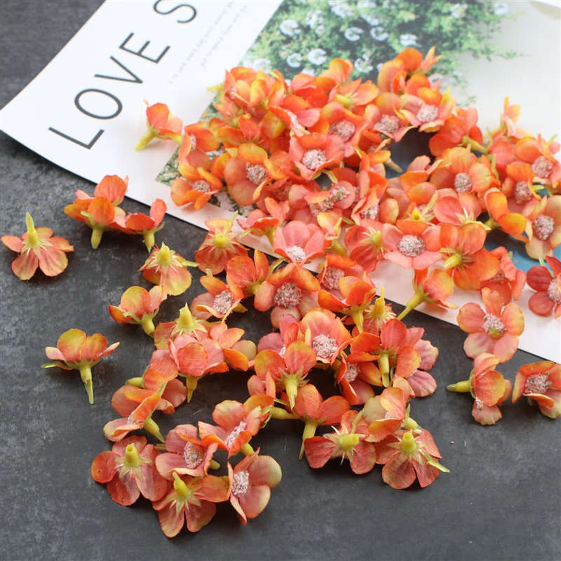 50 stuks 2cm veelkleurige madeliefjeshoofdjes mini zijden kunstbloemen voor kransen, scrapbooks, decoratie voor thuis en bruiloften: Dieporanje