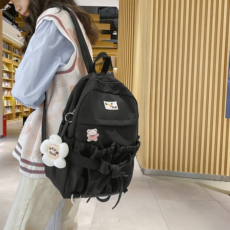 Mochila de estilo coreano para mujer, morral escolar Kawaii de gran capacidad con bolsillos abiertos y lazo, morral de viaje para adolescentes y niñas