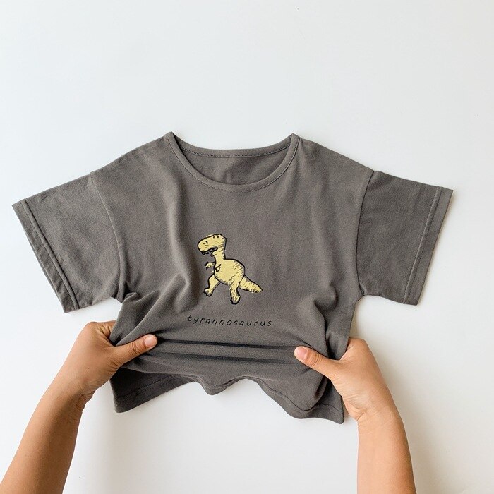 Dei ragazzi di proprietà carino dinosauro stampato morbido magliette dei bambini del cotone per Bambini graffiti Magliette 1-7Y