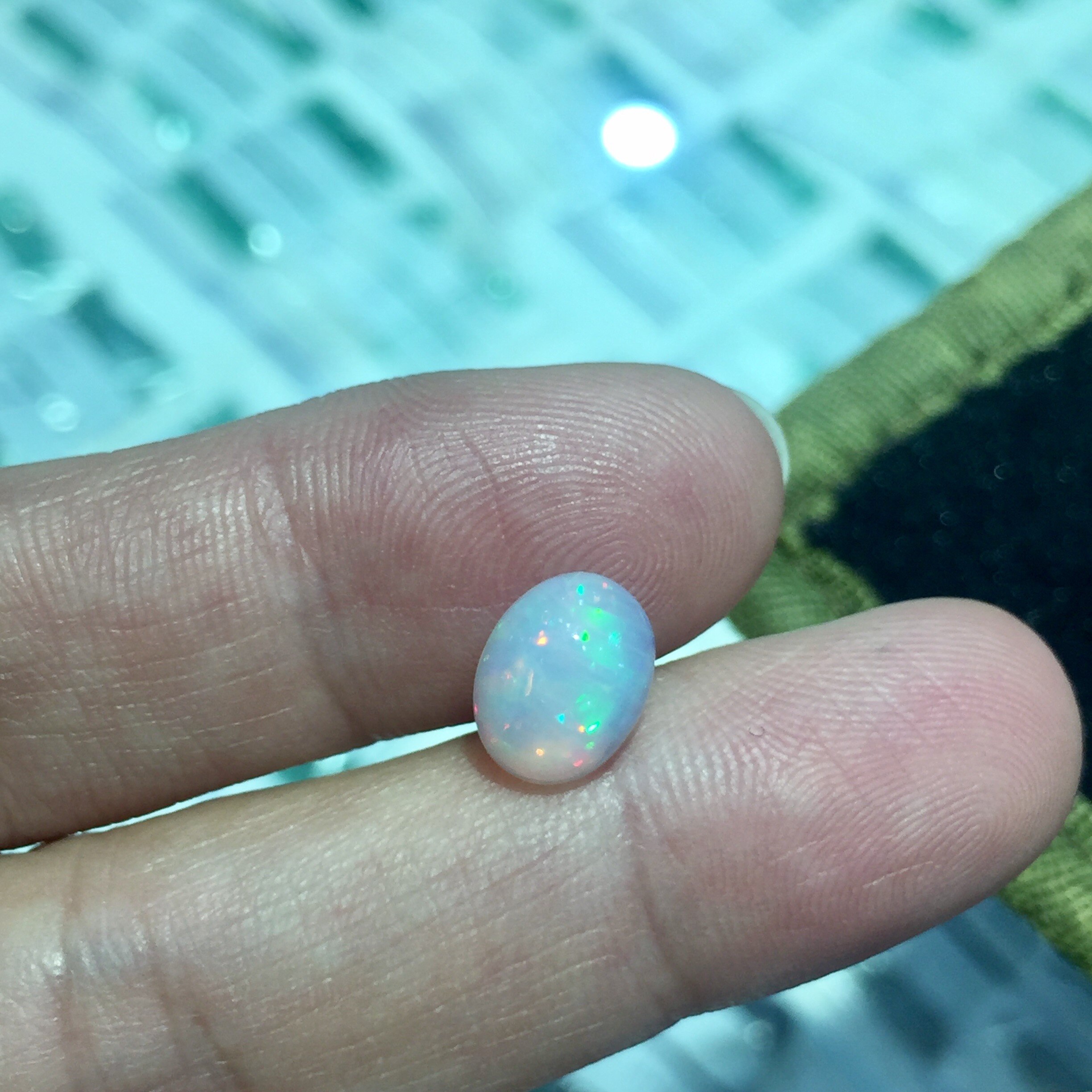 7Mm * 9Mm Natuurlijke Witte Opaal Losse Edelsteen Voor Sieraden Winkel Opal Met Rode Brilliance