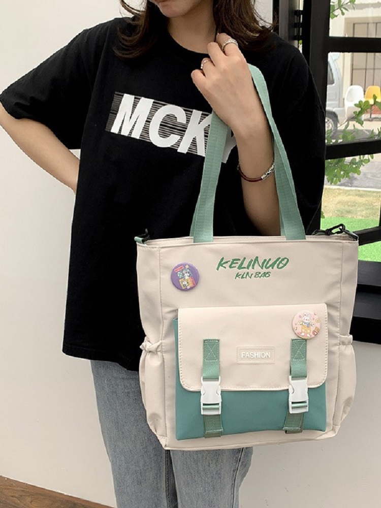 Søt jenteskulderveske skoleveske kvinnelig ins universitetsstudent lerretsveske crossbody stor kapasitet bokveske messengerveske