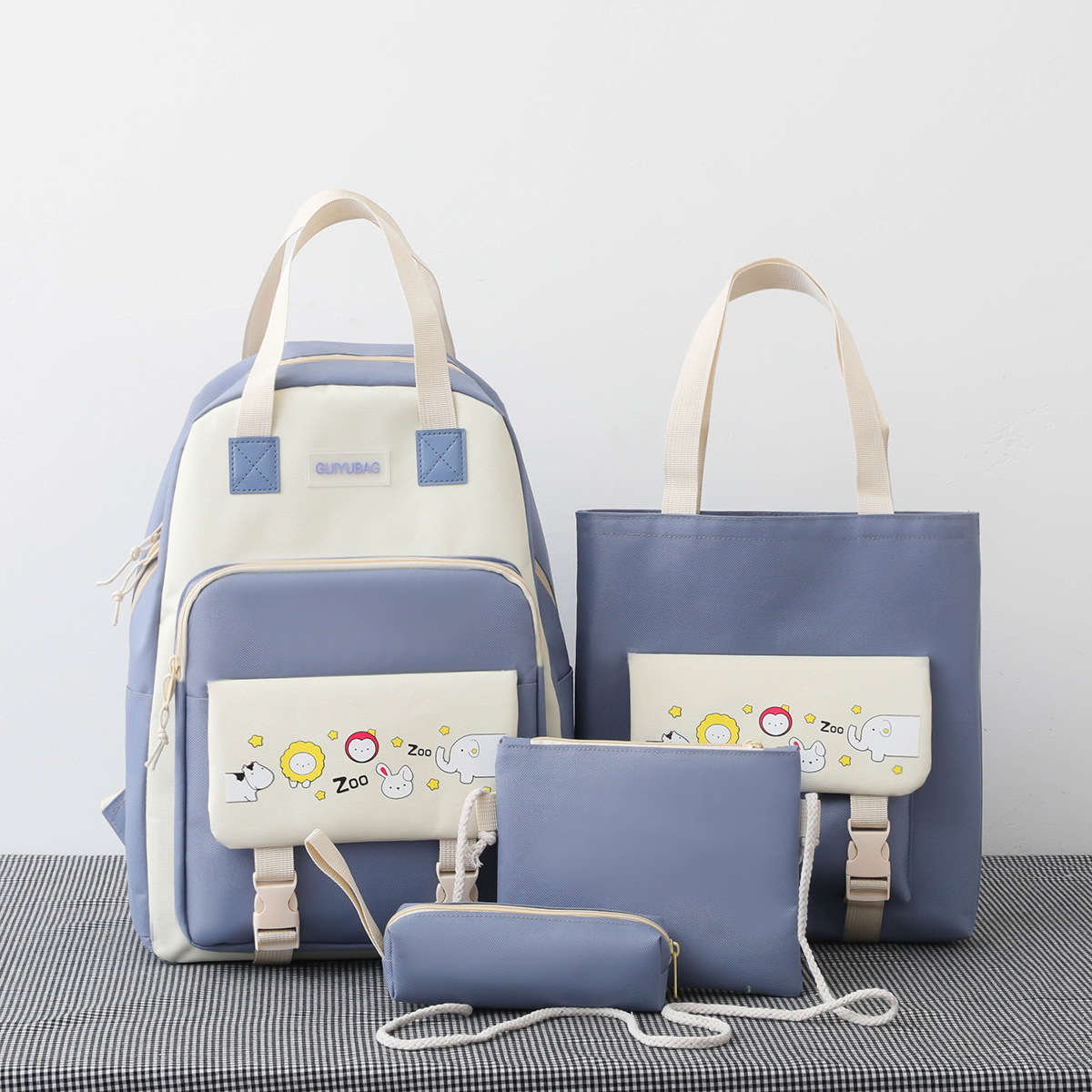 Qyahlybz 4 piece primary school student color matching bag middle school student backpack school children&#39;s girls backpacks: blue