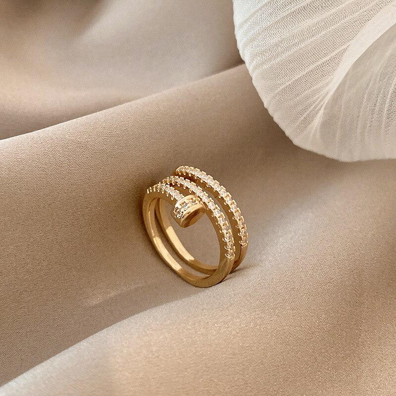 Anello coreano di personalità geometrica femminile del fiore della farfalla femminile di apertura di torsione trasversale a forma di cuore di progettazione di modo all'ingrosso: J1244-E